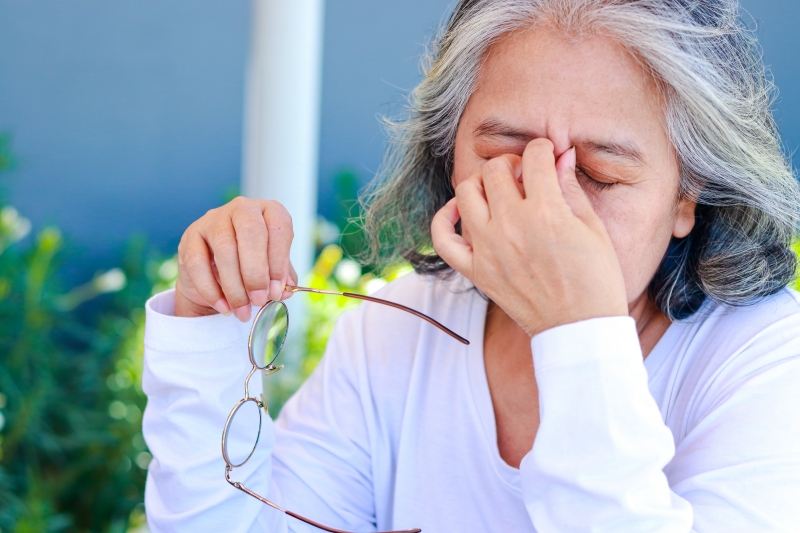 Older woman suffering from macular degeneration